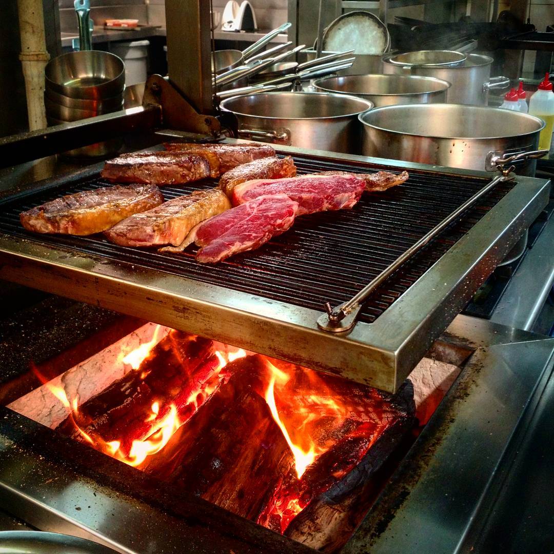 Nothing beats cooking over an open wood fire! Come down and grab yourself a delicious wood grilled dinner. (Vegetarian options also available) #Tasmania #woodgrilled #woodbridge #cooking #tasfoodie #beef #peppermintbay
