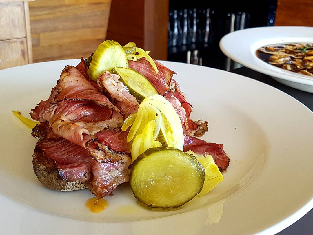 Our house cured pastrami, served warm on our dark seeded rye and house pickles 
Photo: @_tomsandy #tasmania #australia #woodbridge #peppermintbay #tasfoodie #food #pastrami #pickles