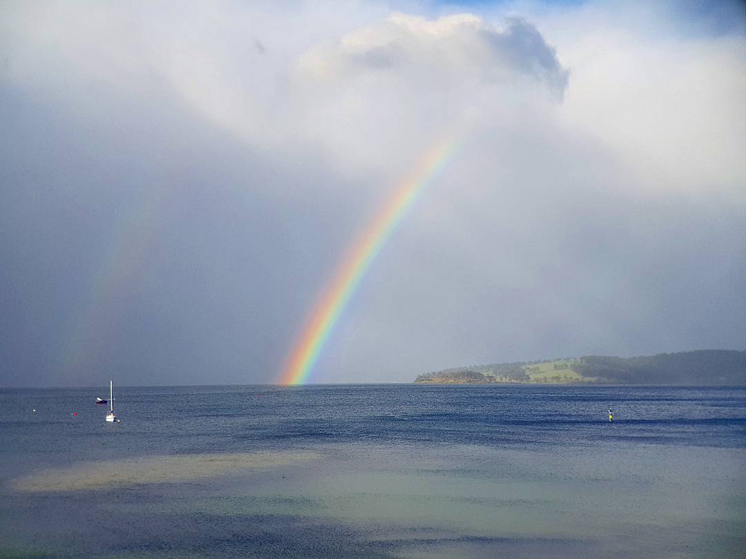 There is always something beautiful to see from our terrace. Regardless the weather! ?: @sandy_mckay92 #rainbow #tasmania #woodbridge #rain #spring #water