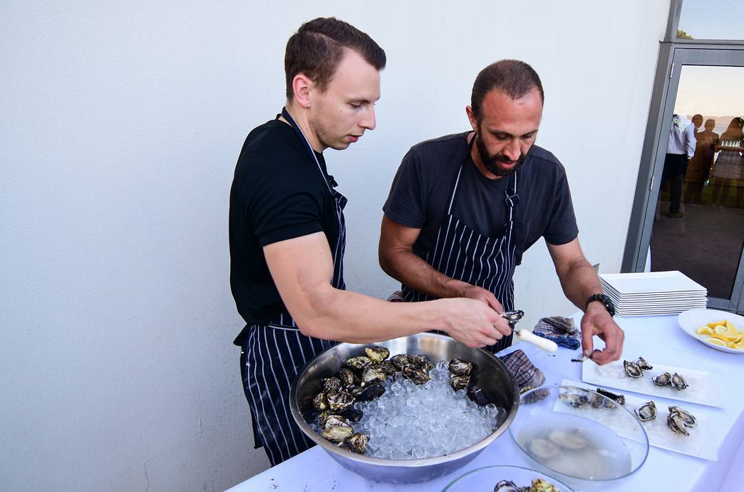 @behrens_93 and @toby_annear shucking up a storm for an outdoors oyster bar we had for our new years eve event ?: @sandy_mckay92 #peppermintbay #tasmania #oysters #shuck #woodbridge #newyearseve