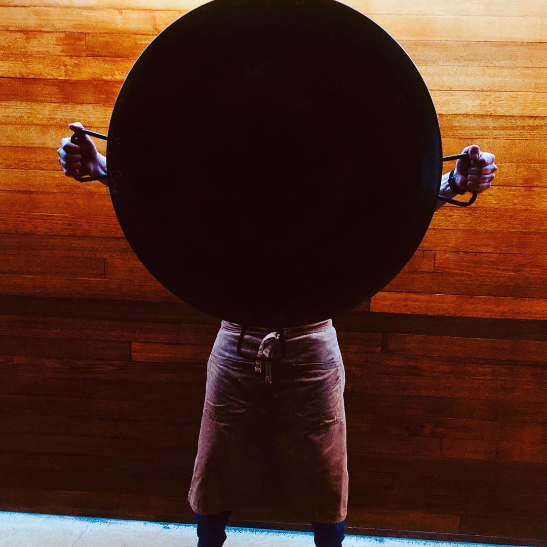 23rd August, Friday night paella with this bloke.. we can’t show you his face ….. his pan is to big.  5.30 till it runs out out. $15 
Outside on the terrace  Fire music food……