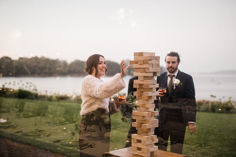 Wedding guests playing giant Jenga